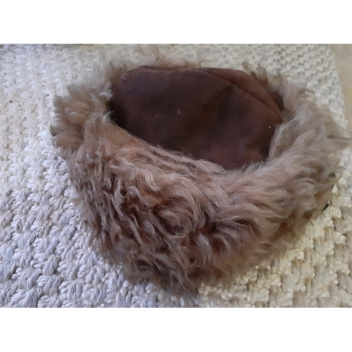 412 - A vintage Russian brown Cossack hat together with a vintage brown musquash fur stole 
Location:RAM