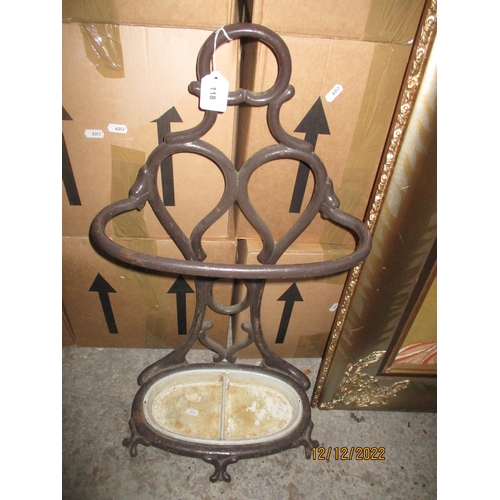 118 - A painted cast iron umbrella stand with inset oval white painted drip tray, along with a set of tail... 