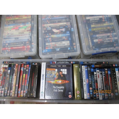 121 - A collection of DVDs to include Doctor Who, Children's DVDs including Chicken Run, along with Thunde... 