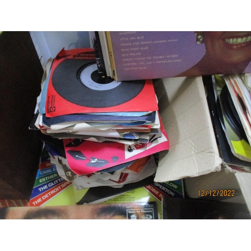 128 - A collection of various mainly 1980's LP's and 45rpm singles to include Michael Jackson, Carly Simon... 