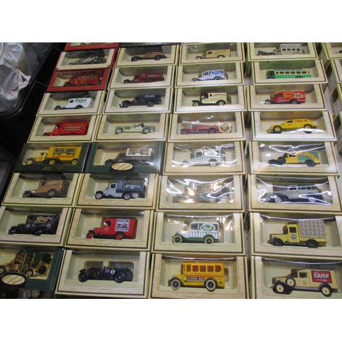 130 - A collection of boxed Days Gone and Lledo and other model diecast vehicles to include Blackpool Tran... 