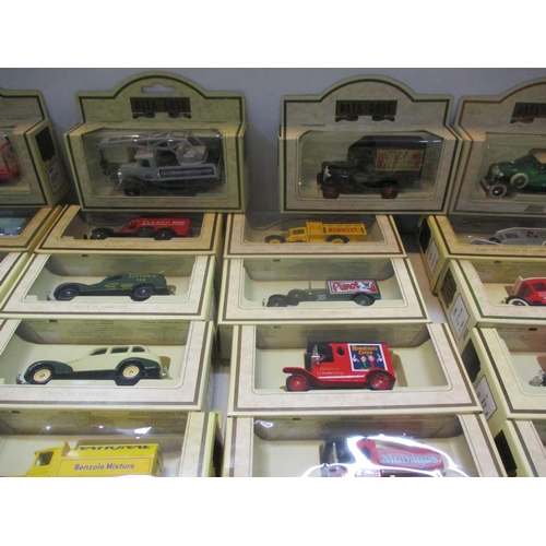 130 - A collection of boxed Days Gone and Lledo and other model diecast vehicles to include Blackpool Tran... 