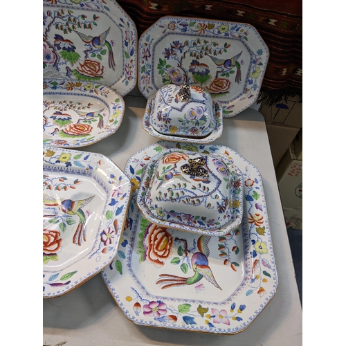 143 - A collection of 19th century Masons flying bird pattern china to include a turkey platter, tureens a... 