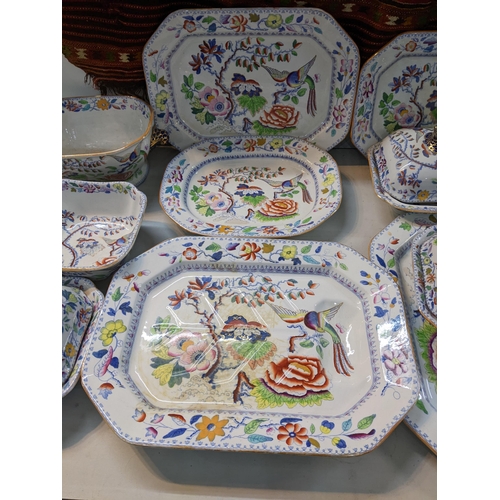 143 - A collection of 19th century Masons flying bird pattern china to include a turkey platter, tureens a... 