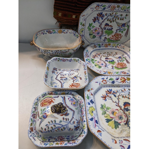 143 - A collection of 19th century Masons flying bird pattern china to include a turkey platter, tureens a... 