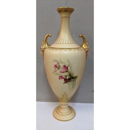 144 - A Royal Worcester blush ivory hand painted porcelain vase with gilt scroll handles and decorated wit... 