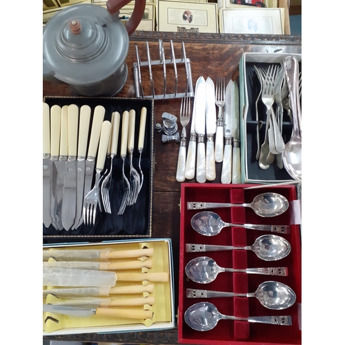 162 - A quantity of mixed silver plate and metalware to include trays, goblets, and cutlery, and a pewter ... 