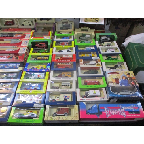 196 - A collection of boxed diecast model vehicles to include Days Gone, 7Up collectables, Gladiators, The... 