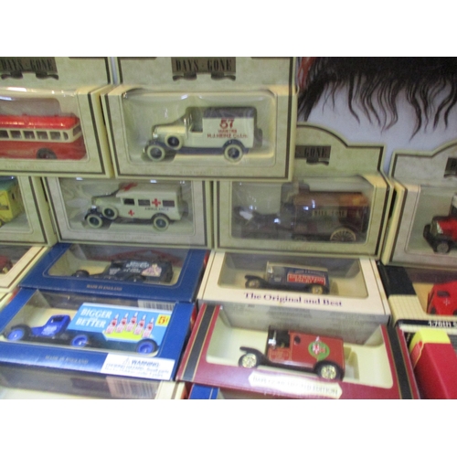 196 - A collection of boxed diecast model vehicles to include Days Gone, 7Up collectables, Gladiators, The... 