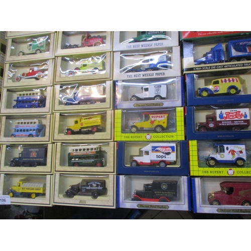 196 - A collection of boxed diecast model vehicles to include Days Gone, 7Up collectables, Gladiators, The... 