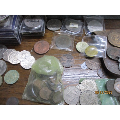 205 - A cash tin containing various British coinage and medals to include a copper George III halfpenny, s... 