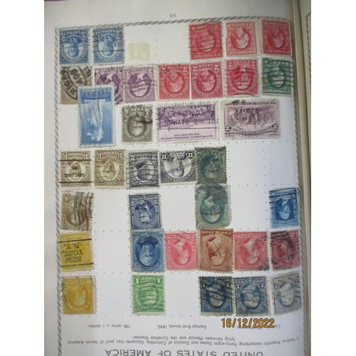 215 - An early 20th century Triumph Stamp album containing mounted world stamps including China, Straits S... 