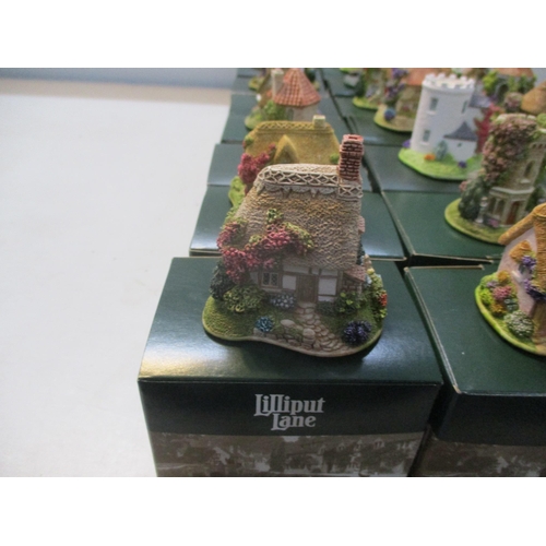 227 - A collection of boxed Lilliput Lane, approximately 30 to include Donecote Cottages, Gulliver's Wishi... 