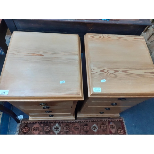 234 - A pair of 20th century pine bedside chests of four drawers, 67cm h 
Location: RAB