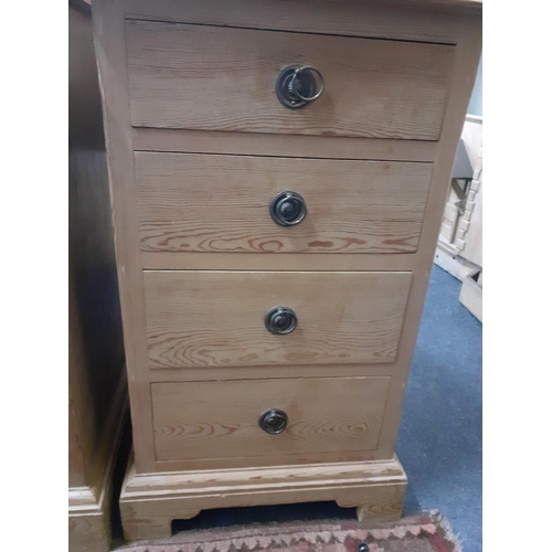 234 - A pair of 20th century pine bedside chests of four drawers, 67cm h 
Location: RAB