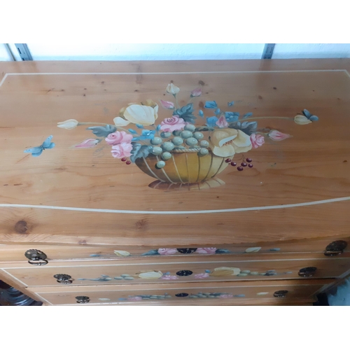 235 - A painted pine chest of four drawers in the French style with painted floral sprays to the drawer fr... 