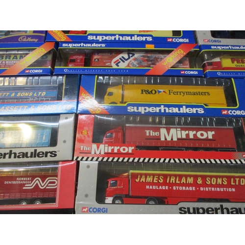 241 - A collection of boxed Corgi diecast model lorries, to include Guinness, KitKat, Tesco and others
Loc... 