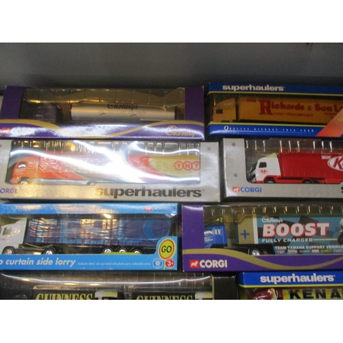 241 - A collection of boxed Corgi diecast model lorries, to include Guinness, KitKat, Tesco and others
Loc... 