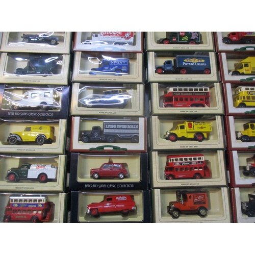 242 - A collection of boxed Days Gone toy cars, busses and lorries to include Smith's potato crisps, Bisto... 