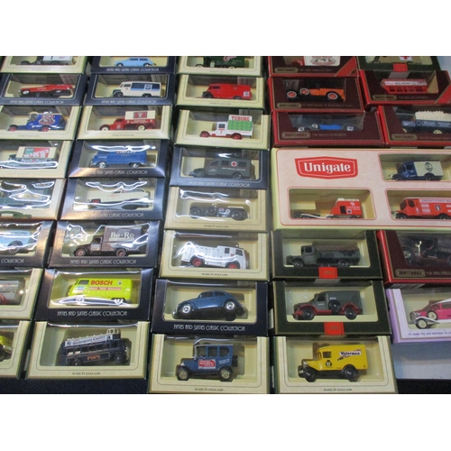 243 - A collection of boxed Days Gone vintage models, matchbox cars, buses and vans to include Kodak, Bosc... 