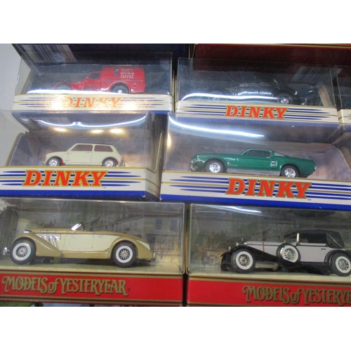 244 - A collection of approximately 30 boxed Dinky toy cars and others to include Mustang, the R Type Bent... 