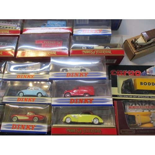 244 - A collection of approximately 30 boxed Dinky toy cars and others to include Mustang, the R Type Bent... 