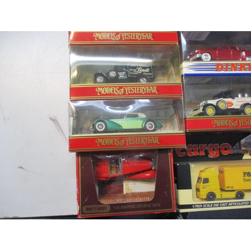 245 - A collection of approximately 20 boxed Dinky and Matchbox cars to include Grosser Mercedes, Golden H... 