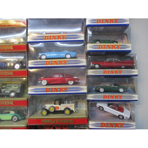 245 - A collection of approximately 20 boxed Dinky and Matchbox cars to include Grosser Mercedes, Golden H... 