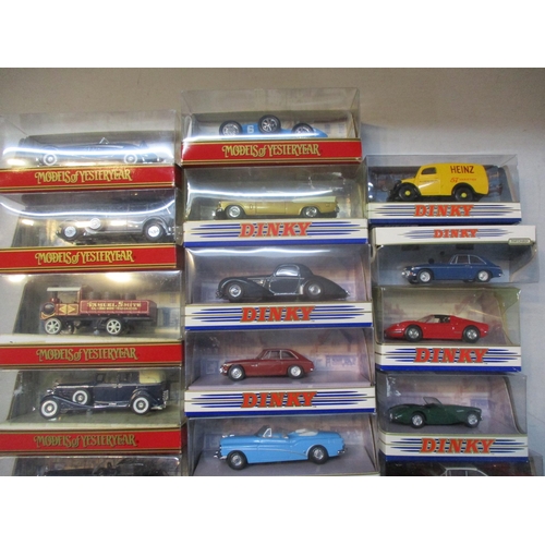 245 - A collection of approximately 20 boxed Dinky and Matchbox cars to include Grosser Mercedes, Golden H... 