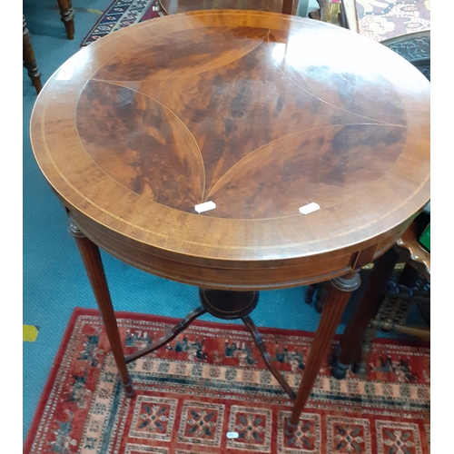 277 - An Edwardian mahogany two tier circular occasional table, inlaid to the top
Location: RAF