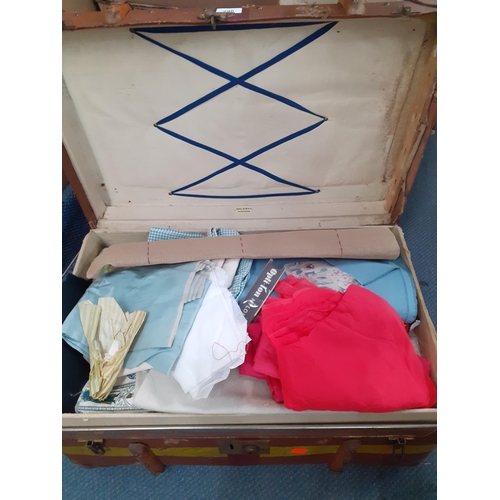 290 - A vintage Kendle, Milne & Co canvas and leather clad trunk and contents to include fabric remnants
L... 