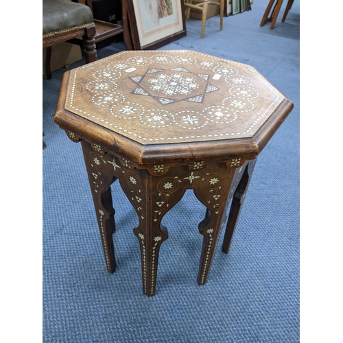 291 - A late 19th/early 20th century occasional table of octagonal form inlaid with bone and mother of pea... 