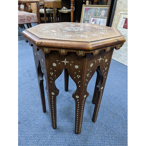 291 - A late 19th/early 20th century occasional table of octagonal form inlaid with bone and mother of pea... 