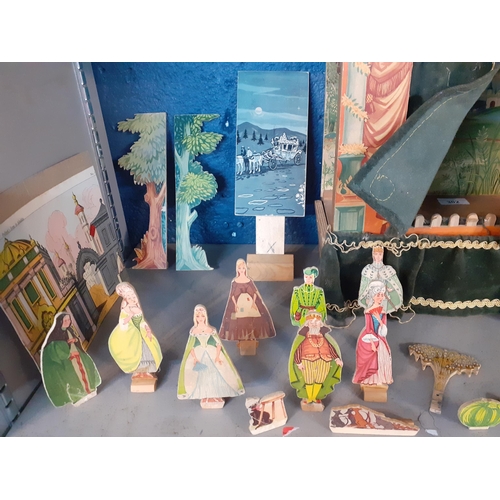 302 - A mid 20th century puppet theatre with wooden and cardboard props 37cm h x 34cm w x 17cm d Location:... 