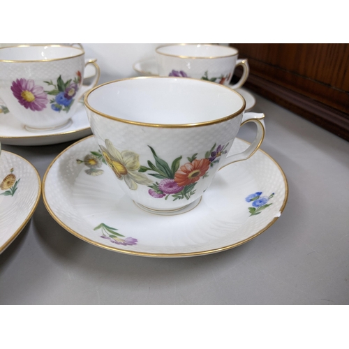 303 - A set of eight Royal Copenhagen tea cups and saucers, numbered 1870 to the bases
Location:6.2