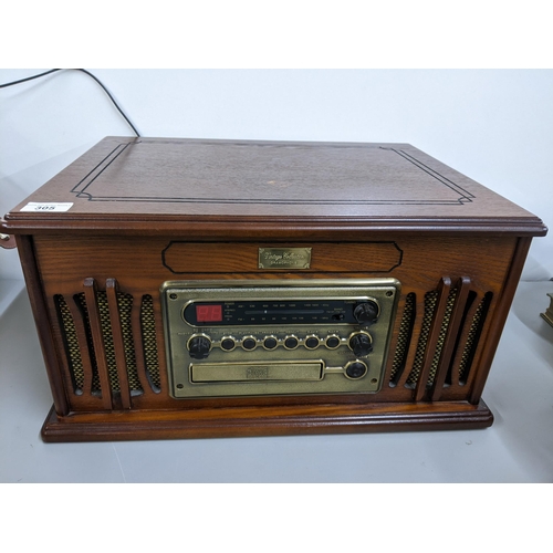 305 - A 'Vintage Collection' gramophone player with built in CD player and radio player
Location:A1F