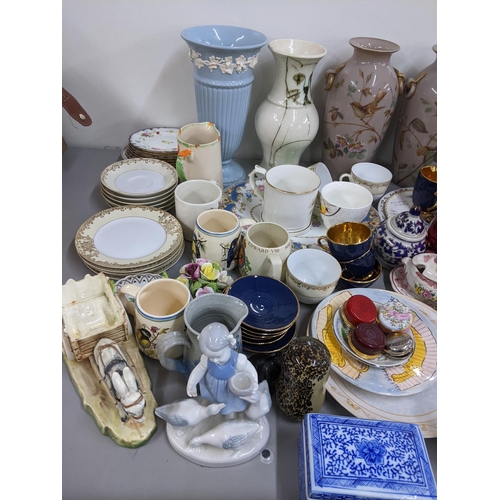 307 - A mixed lot to include a Wedgwood owl paperweight, pill boxes, Wedgwood Etruria vase, pair of circa ... 