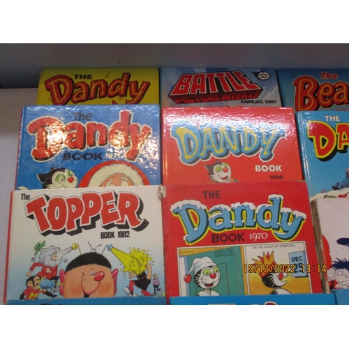 321 - A collection of annuals 1960s to 1980s to include The Beano and Dandy, along with 1935 Jubilee book ... 