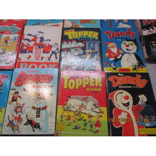 321 - A collection of annuals 1960s to 1980s to include The Beano and Dandy, along with 1935 Jubilee book ... 