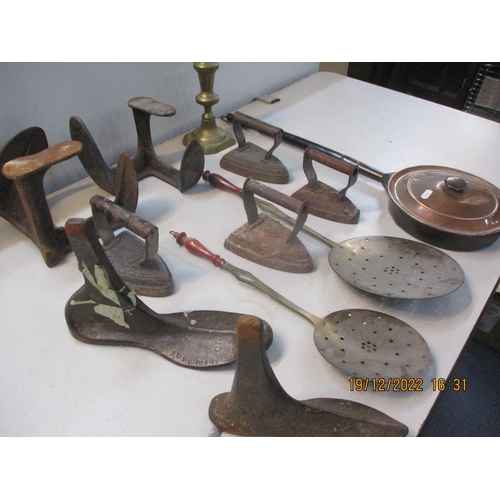 324 - Metalware to include shoe lasts, flat irons, bed warmer, candlestick, chestnut roaster and other ite... 