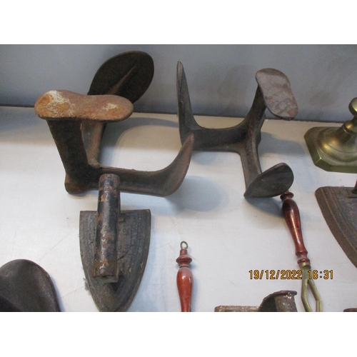 324 - Metalware to include shoe lasts, flat irons, bed warmer, candlestick, chestnut roaster and other ite... 