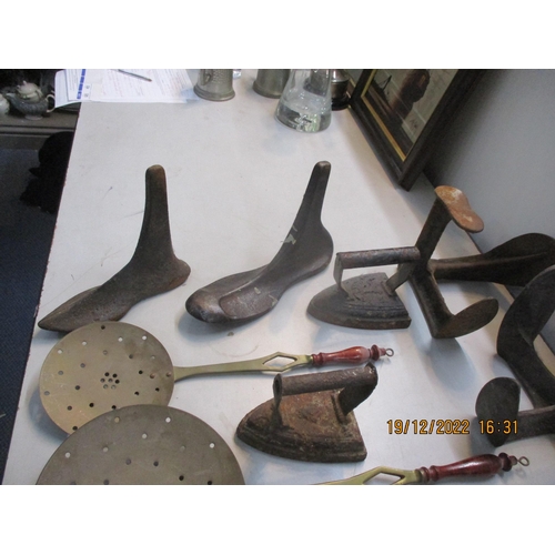 324 - Metalware to include shoe lasts, flat irons, bed warmer, candlestick, chestnut roaster and other ite... 