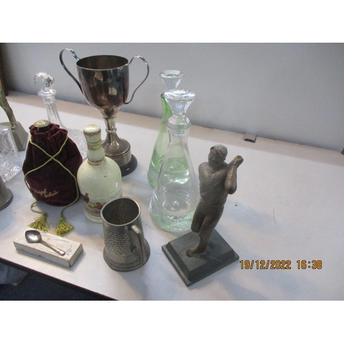 325 - Trophies to include two fashioned as golfers, and a silver plated football cup, along with glass dec... 