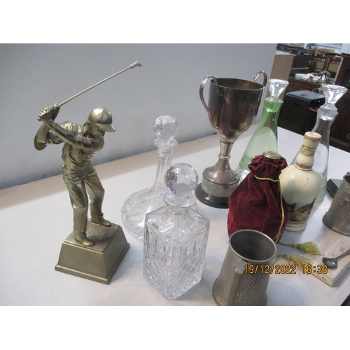 325 - Trophies to include two fashioned as golfers, and a silver plated football cup, along with glass dec... 