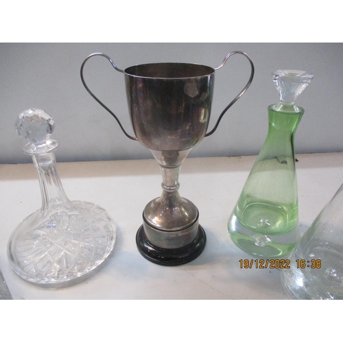 325 - Trophies to include two fashioned as golfers, and a silver plated football cup, along with glass dec... 