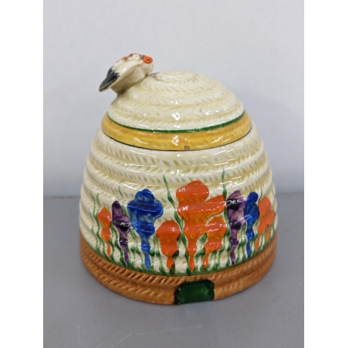 329 - A Clarice Cliff crocus painted honey pot jar
Location:10.1