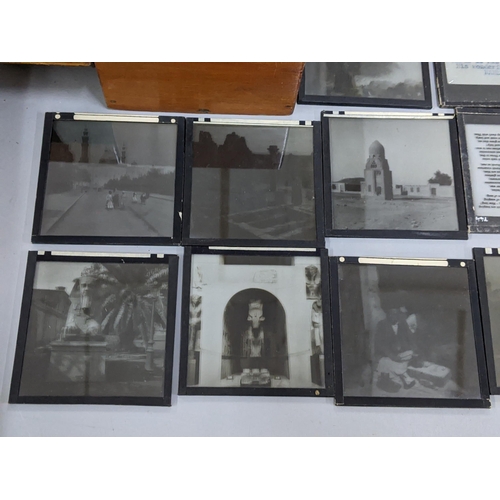 338 - A selection of magic lantern slides contained in two boxes to include some depicting scenes of Egypt... 