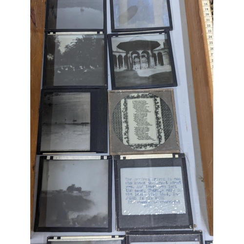 338 - A selection of magic lantern slides contained in two boxes to include some depicting scenes of Egypt... 