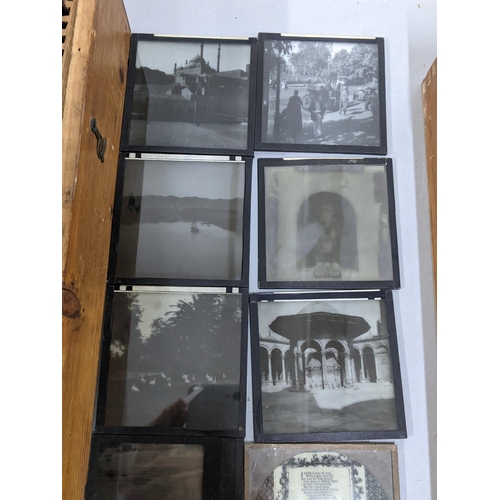 338 - A selection of magic lantern slides contained in two boxes to include some depicting scenes of Egypt... 