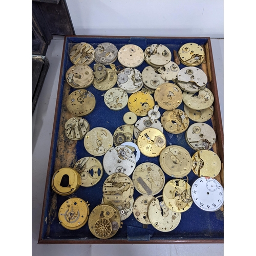 341 - A selection of pocket watch pars, wristwatches and travel clocks to include a late 18th/early 19th c... 